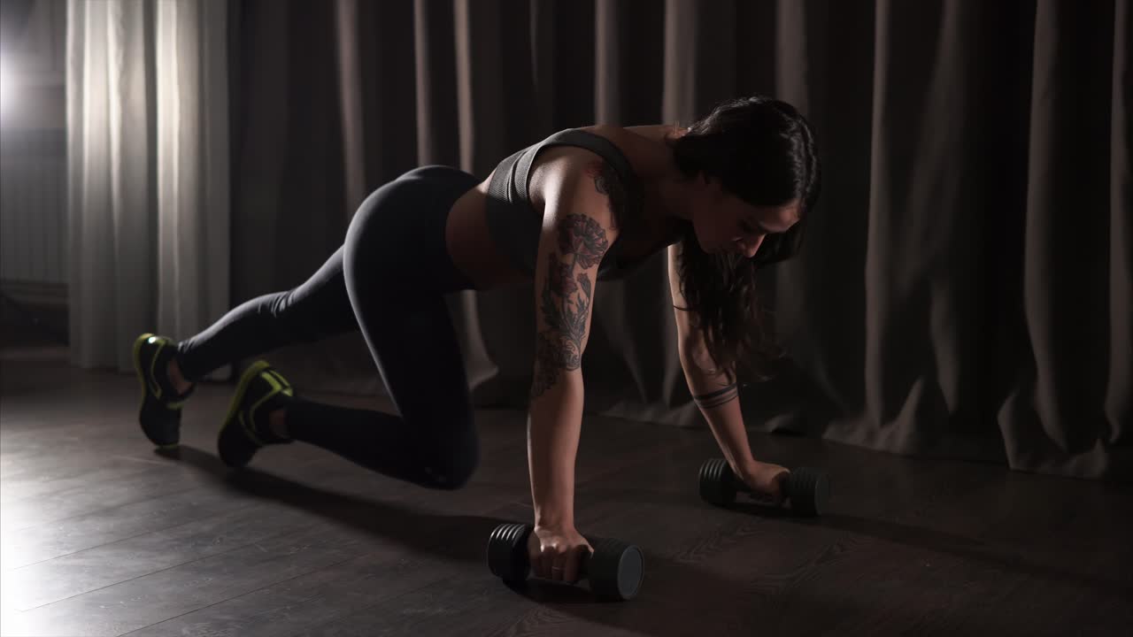 Woman Doing Weighted Push-ups