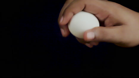 egg cracking by hiting on the side of a bowl for chicken marination, chef crack egg on kitchen for cooking