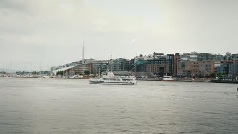 a view of the city of oslo with the recognizable town hall building 4k video