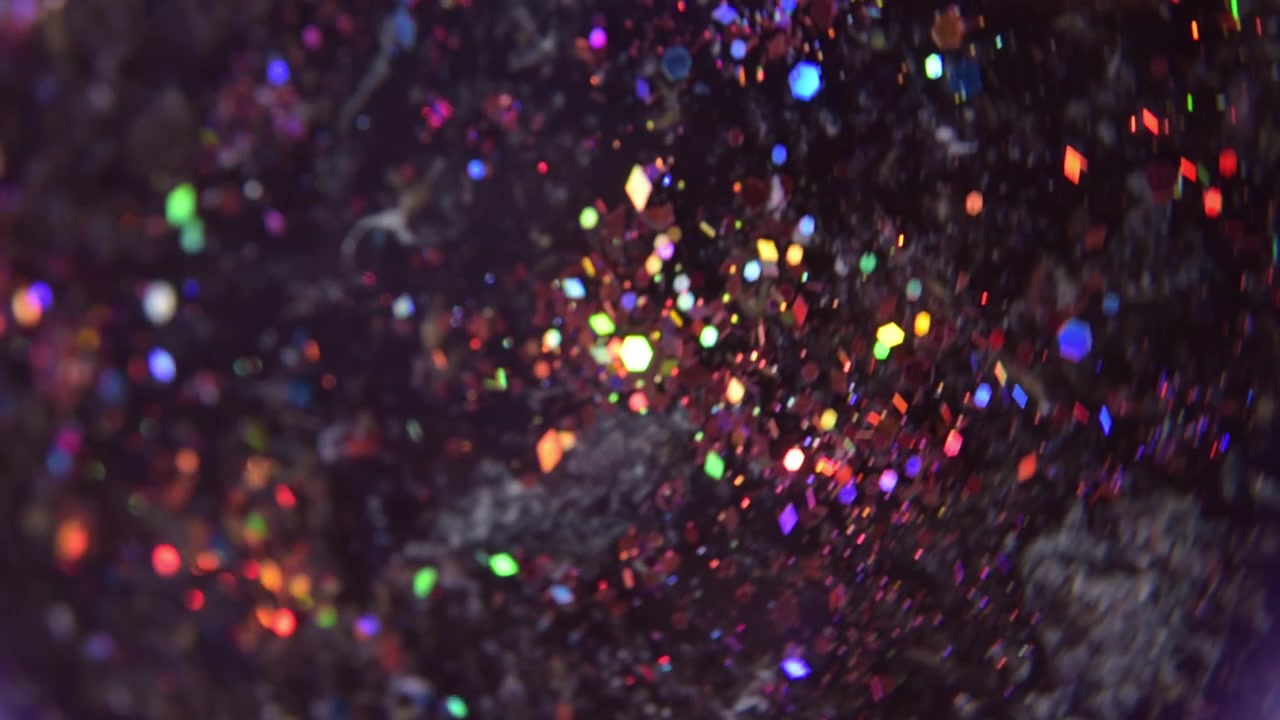 Close up multicolor glitter particles