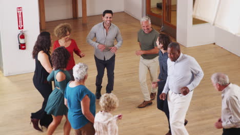 people having fun attending dance class in community center