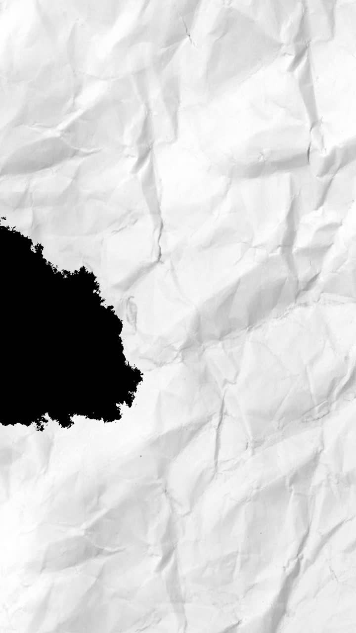 Crumpled White Paper Transition on Black Background