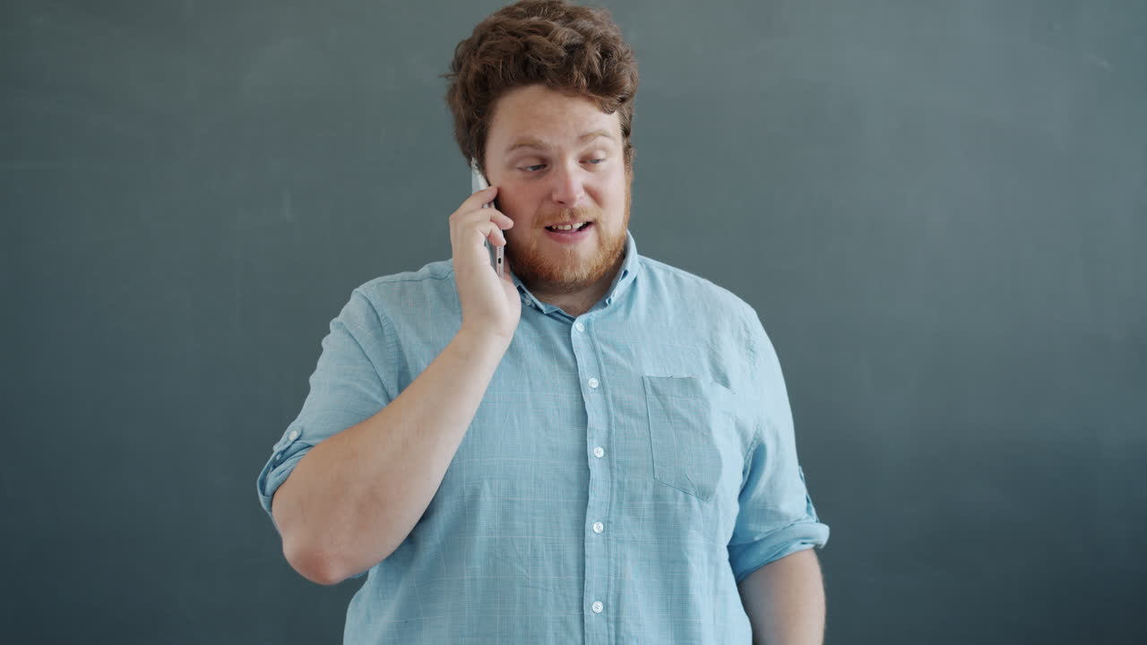 Man Talking on Phone, Surprised Expression