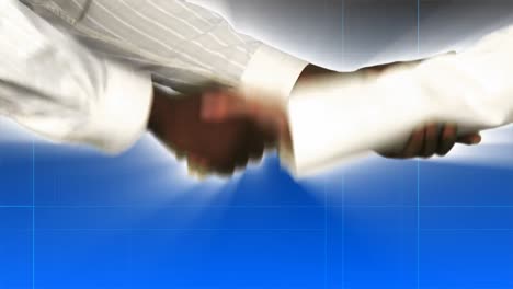 close up of businessman and businesswoman shaking hands