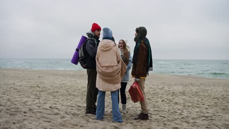 friends at the beach in winter