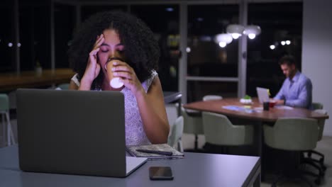 young office executives working over laptop in a modern office