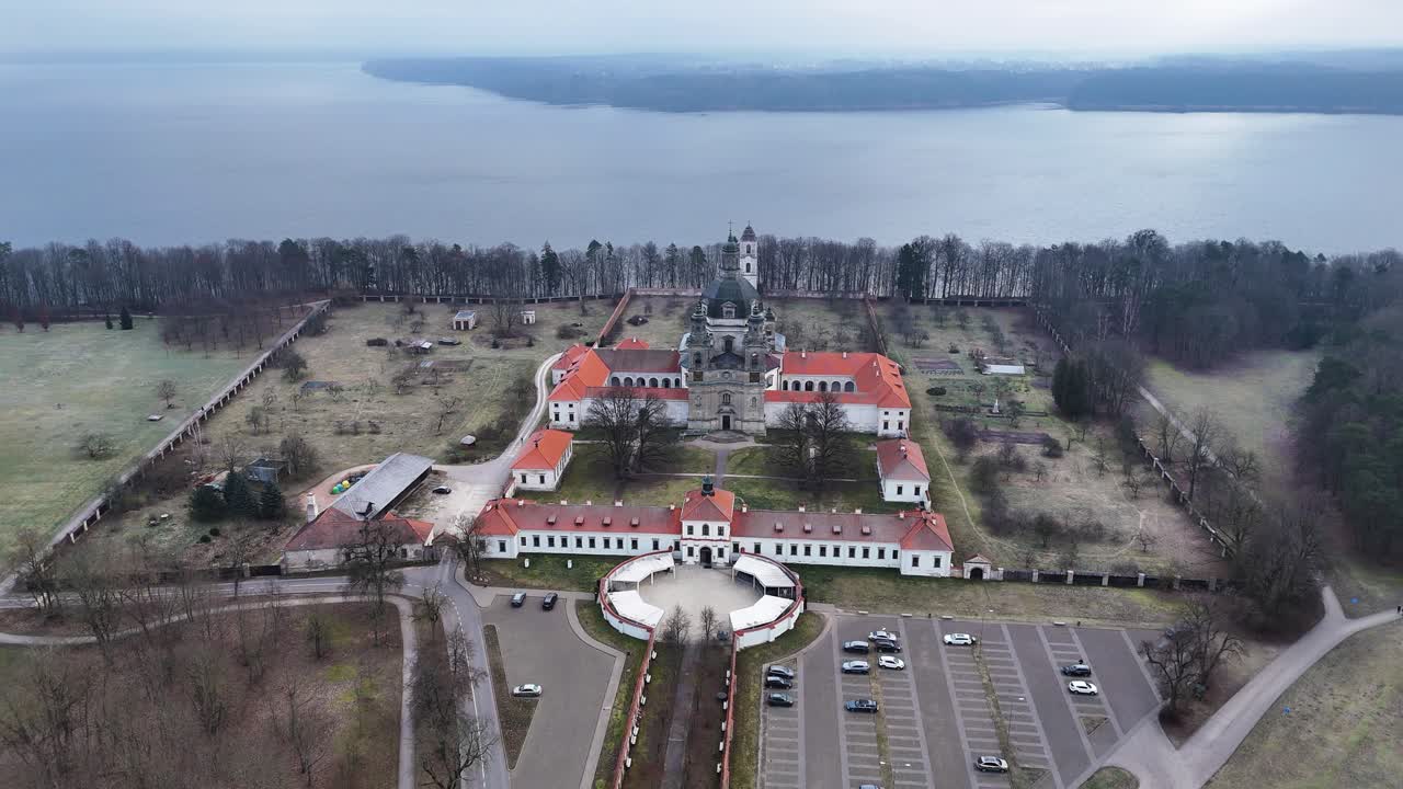 Monastery complex and massive lake in Kaunas, aerial view