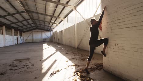 male dancer in an empty warehouse