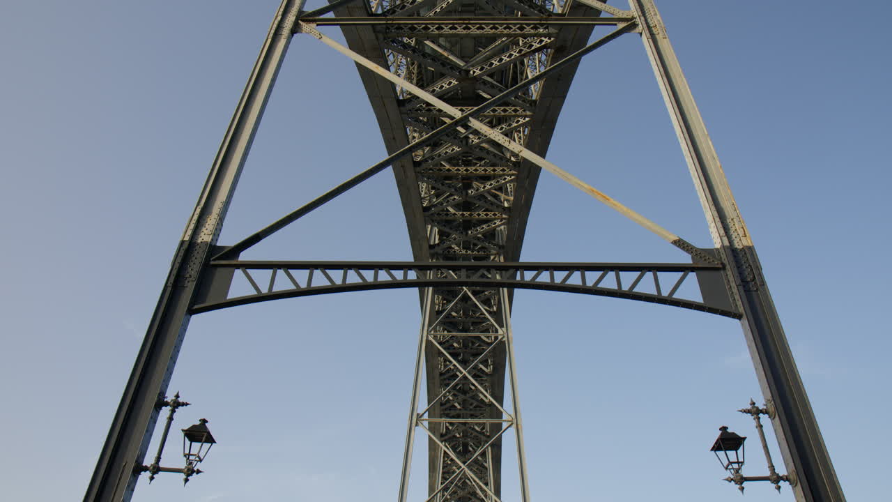 Dom Luis I Bridge seen from below in Porto. Tilt up view