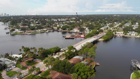 4k drone video of bridge repair on tampa bay in the shadow of downtown st petersburg, florida on sunny summer day