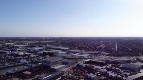 Aerial-View-Of-Shipyard,-Industrial-Area-And-Hendrik-Ido-Ambacht-Town-At-Daytime-In-Netherlands