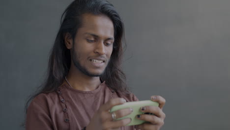 man using a smartphone