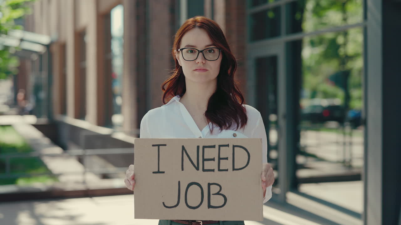 Woman Holding Sign Seeking Employment