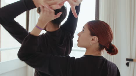 contemporary dancers practicing lyrical dance in studio