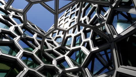 modern building with hexagonal glass facade