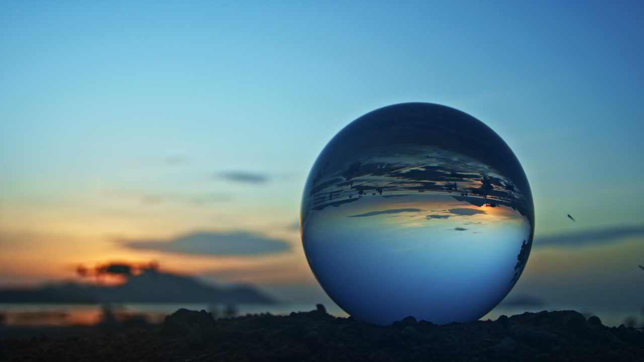 Drone flying in front the Crystal ball in twilight.