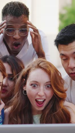 diverse group of friends reacting with shock and amazement