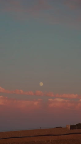 full moon in the blue evening sky