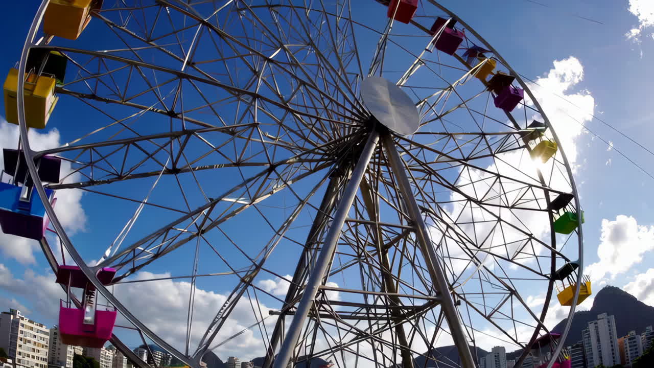 Colorful Ferris Wheel Against a Bright Blue Sky