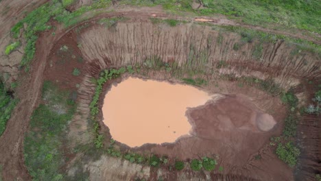 muddy water at quarry site near african farm in loitokitok, kenya