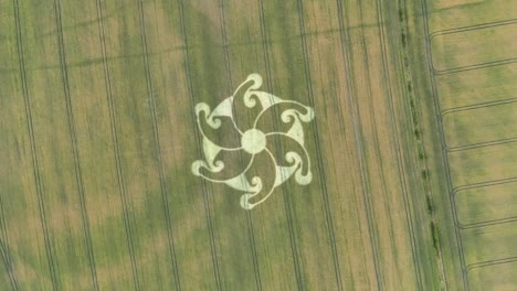 aerial view of crop circles in etchilhampton, wiltshire - top down view, flying towards the pattern