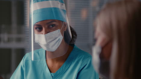 nurse and patient consultation during pandemic