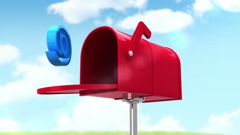 at symbol in the mailbox on cloudy background