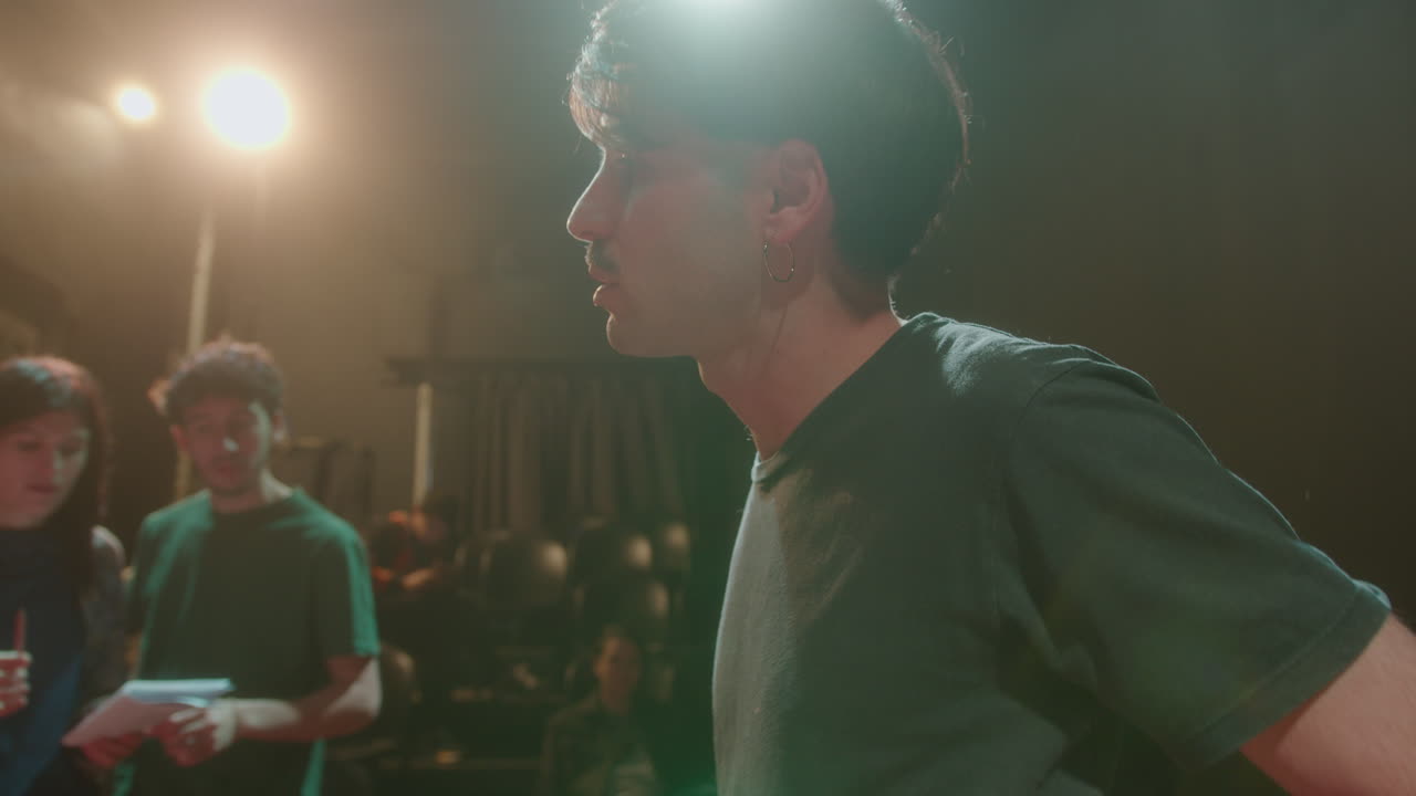 Actress Talking with Partner during Rehearsal on Theater Stage