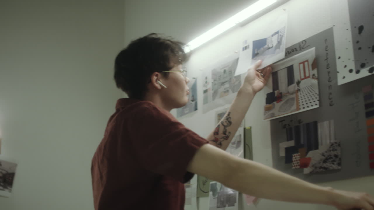 Young Designer Working on a Mood Board for Interior Design Project