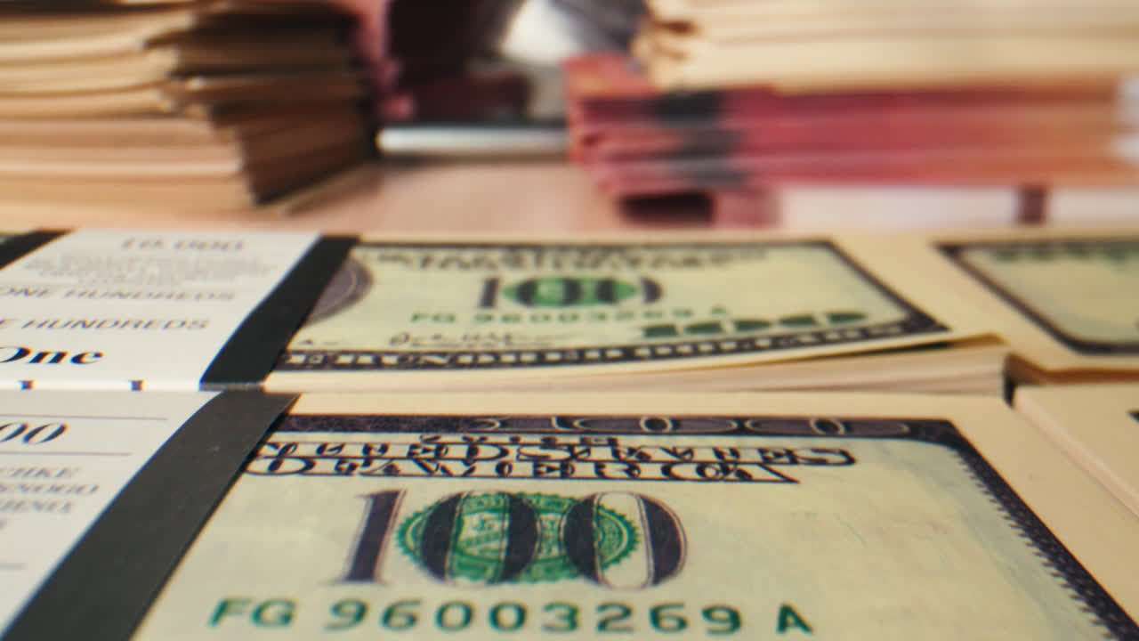 Specialised police officer Counting dollar banknotes in crime lab, conceptual image. High quality 4k footage