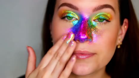 maquillaje facial de brillo de arco iris