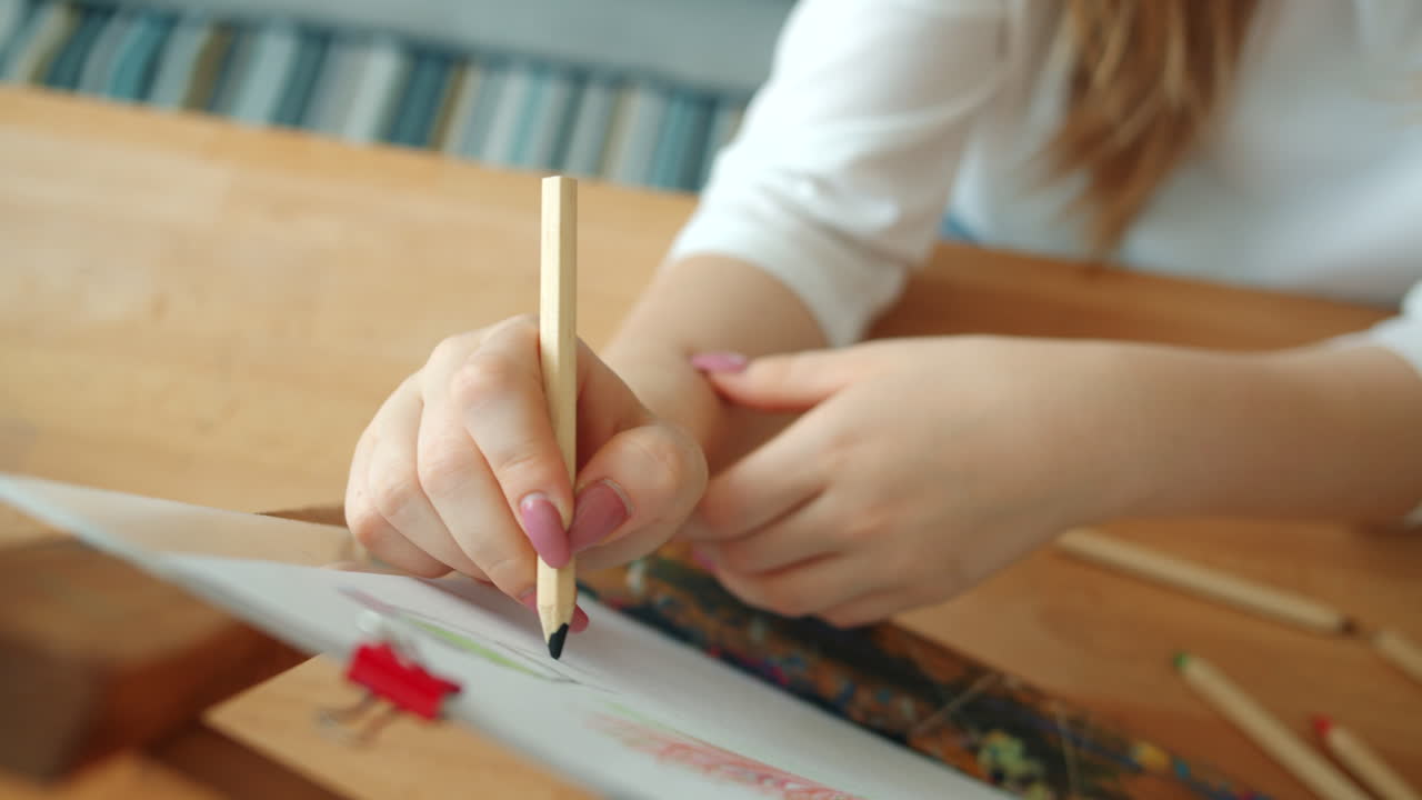 Woman Drawing with Pencil
