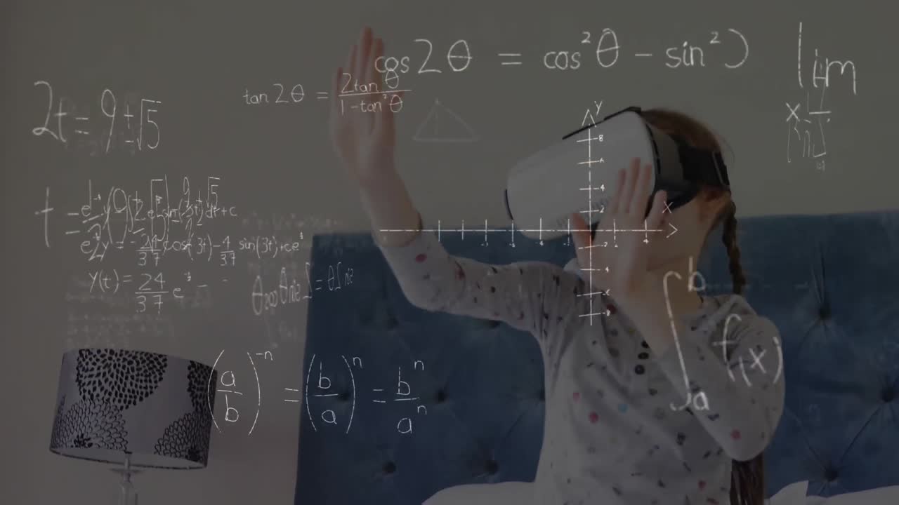 가상 현실 헤드 ⁇ 을 착용하면서 침대에 앉아있는 작은 소녀