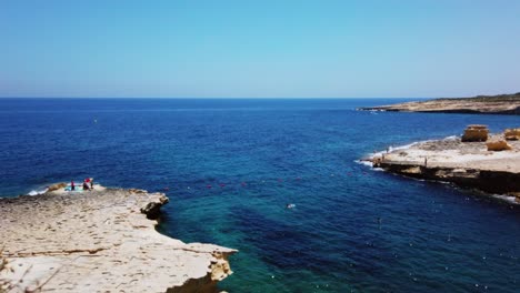 video from malta, st peter's pool on a sunny summer day