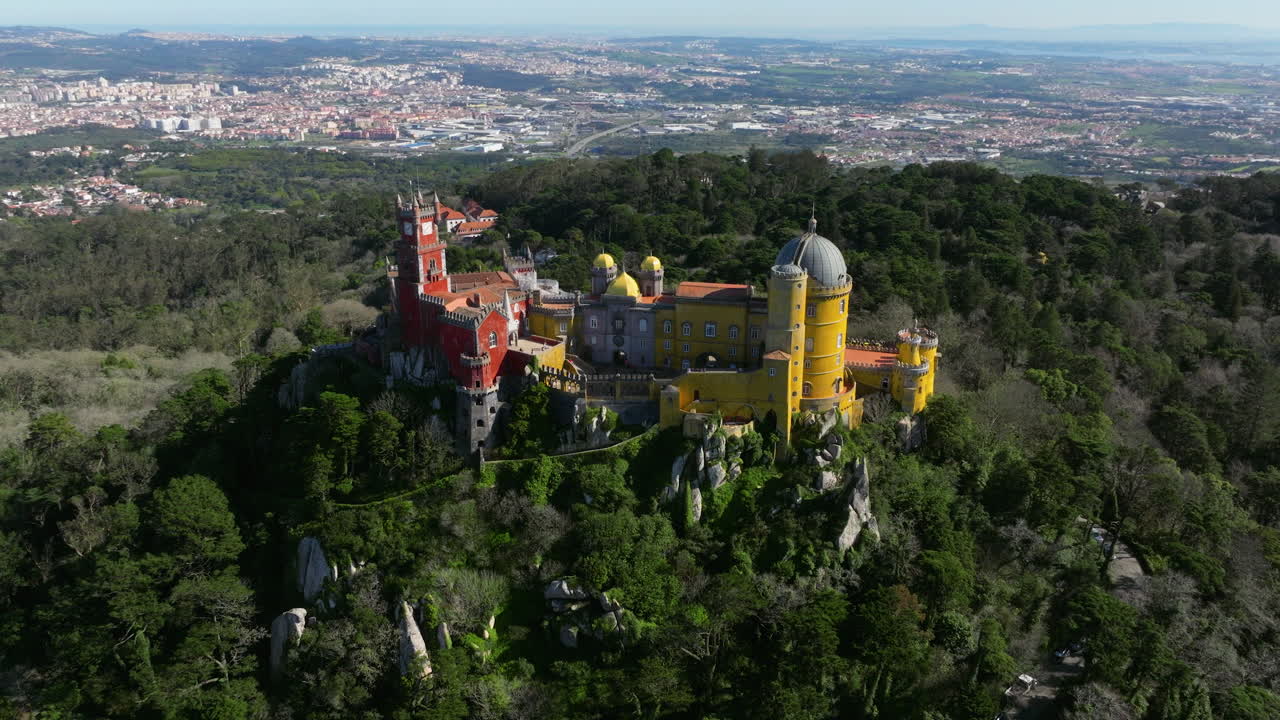 Portugal’s Pena Palace overlooking town aerial