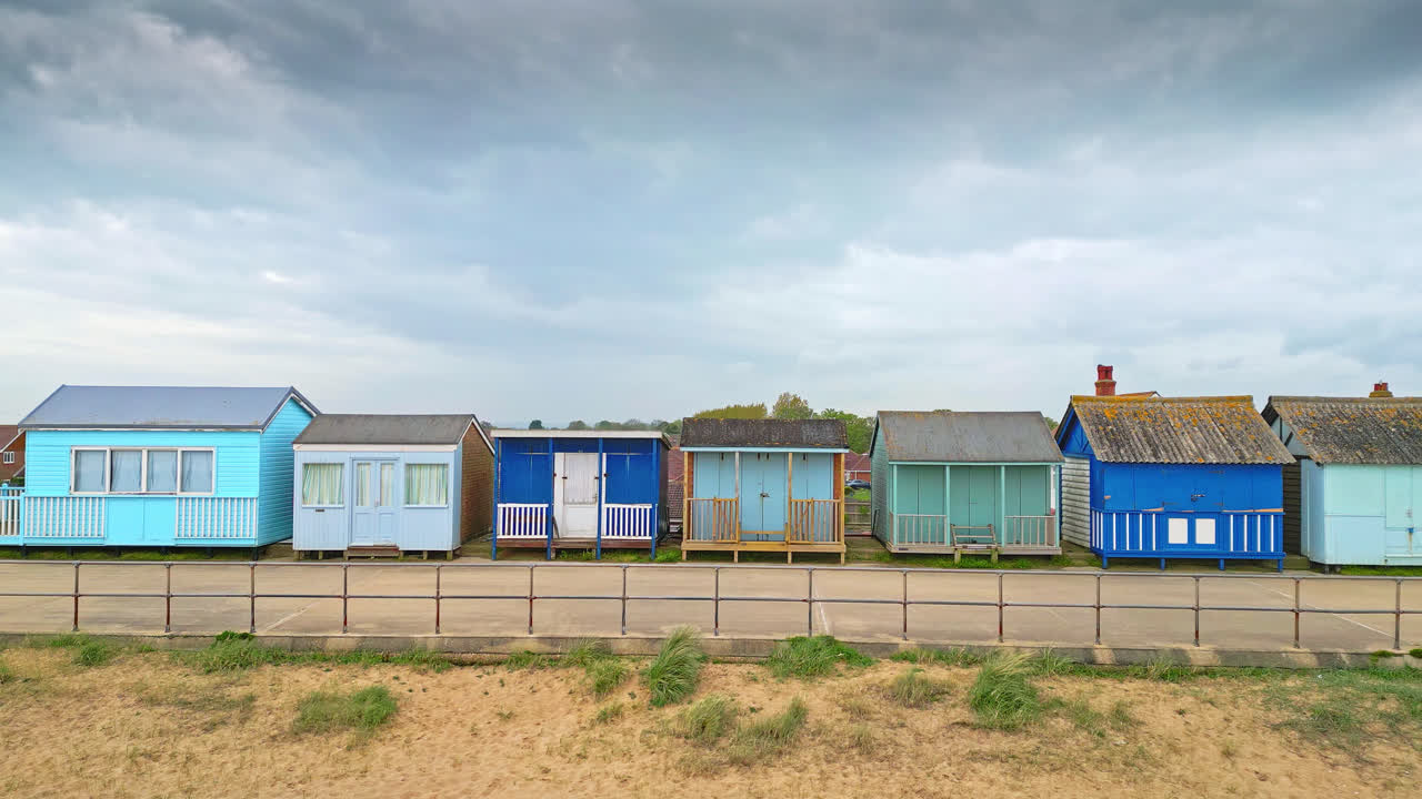 Aerial scenes capture Mablethorpe's essence, featuring beach huts, sandy beaches, amusement parks, rides, and the lively tourist scene