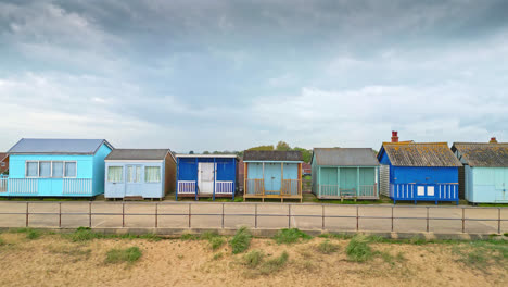 aerial scenes capture mablethorpe's essence, featuring beach huts, sandy beaches, amusement parks, rides, and the lively tourist scene