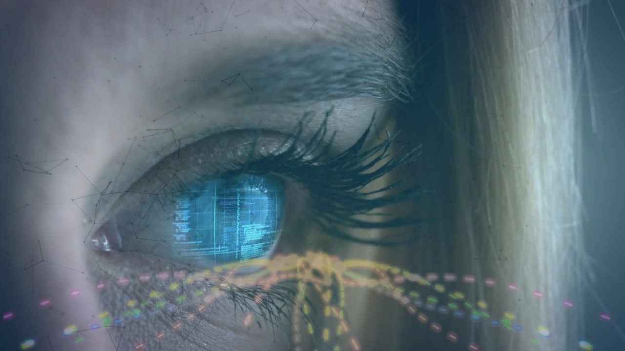 Vertical video: Opening woman's right eye in studio with holo nodes appearing focusing on screen