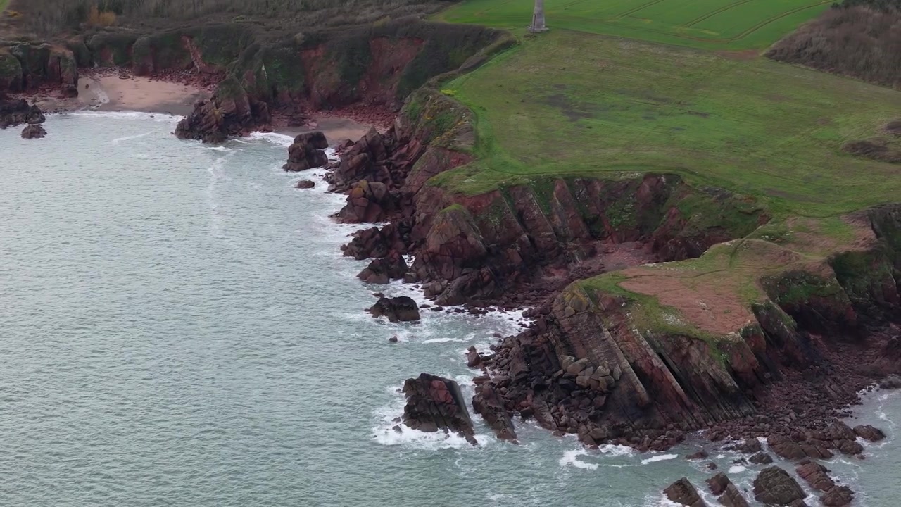 Sleeping bay Milford Haven lush rugged coastline cove cliffs overlooking Pembrokeshire seascape