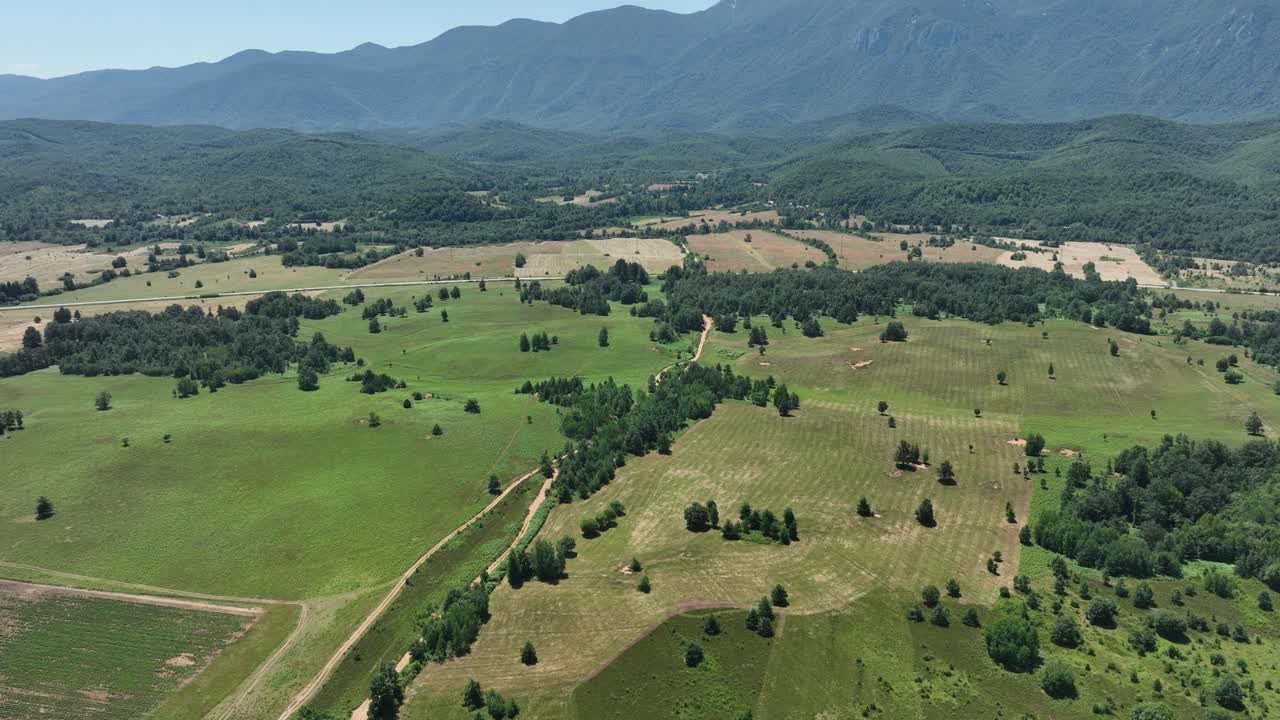 Tilt down in agricultural region with crop monitoring done by drones with multispectral sensors.