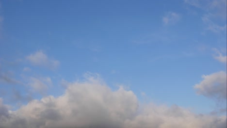 blue sky white clouds. puffy fluffy white clouds. cumulus cloud scape timelapse. summer blue sky time lapse. dramatic majestic amazing blue sky. soft white clouds form. clouds time lapse background