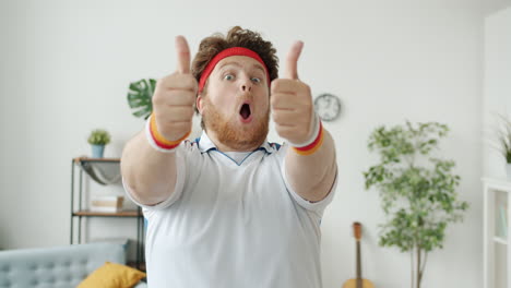 funny man showing thumbs up