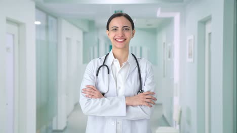 portrait of happy indian female doctor