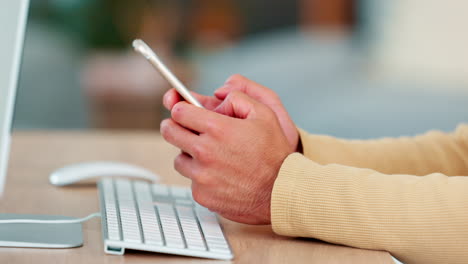 social media manager typing on a phone