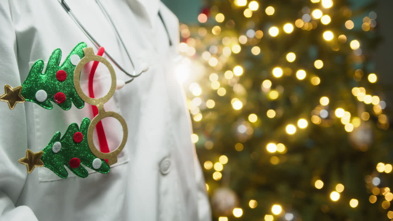 Ophthalmologist Doctor Wishes His Patients a Merry Christmas in Front of Tree