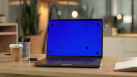 Green-screen,-office-and-mockup-laptop-on-desk