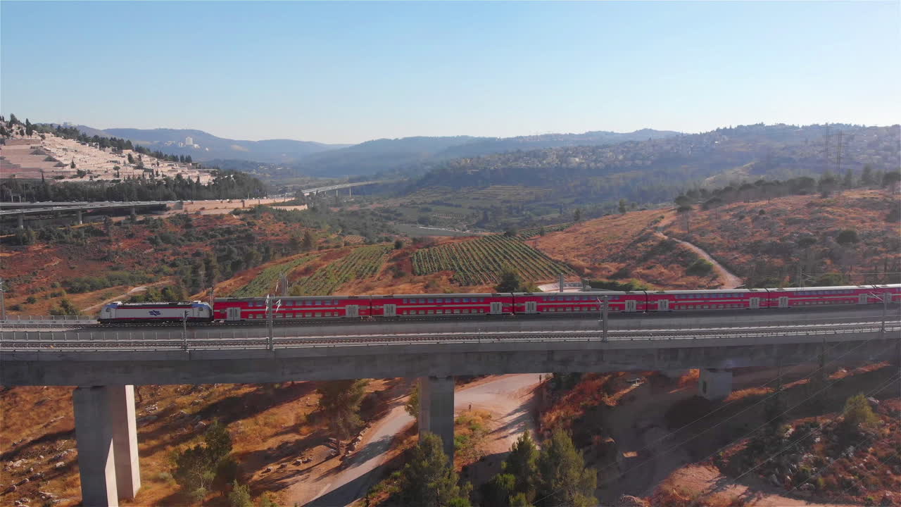 Train on large bridge aerial
