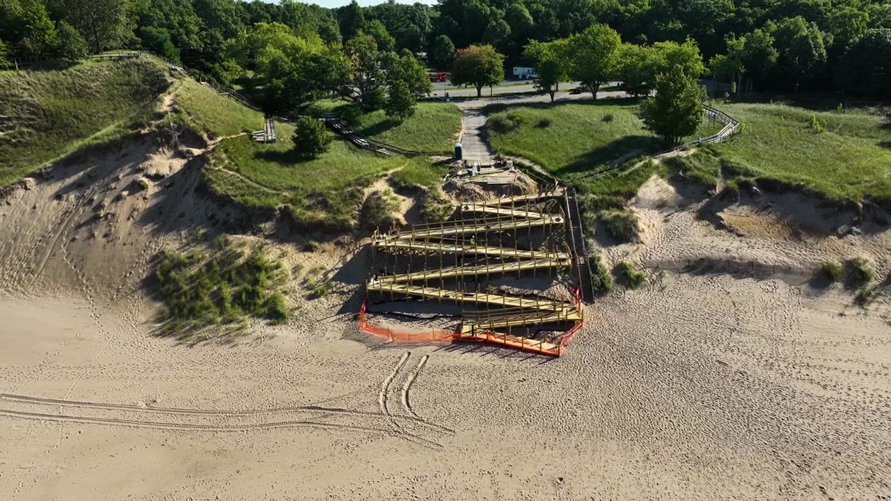 Reverse aerial tracking of the new walkway being built at Kruse Park.