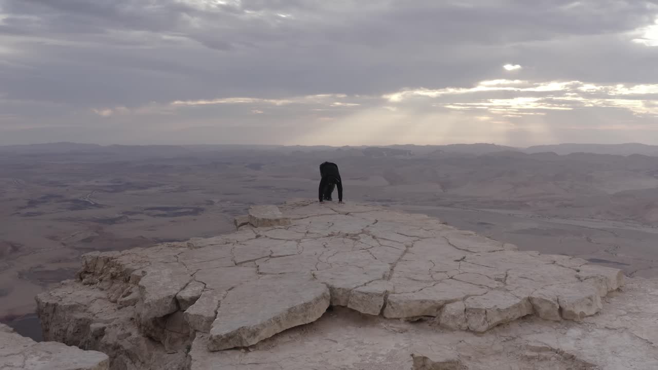 Handstand on Desert Cliff