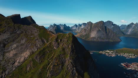 reinebringen mountain summit with a stunning view over the coast of lofoten islands. scenic aerial